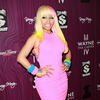 Extra Scoop: Nicki Minaj Talks Fashion-Mogul Rivalry with Lil Wayne