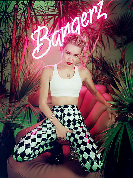 Miley Cyrus Grabs Crotch, Goes Braless in New Pics
