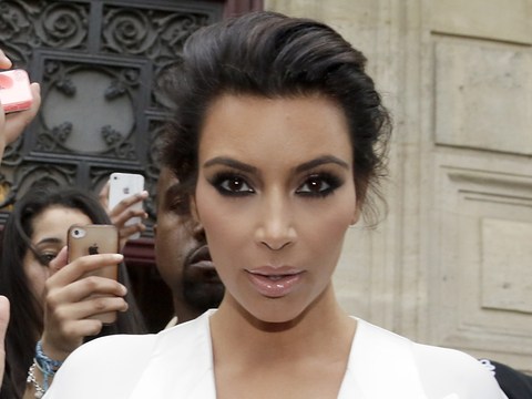 Extra Scoop: Kim Kardashian Busting Out of Her Bikini in Mexico!