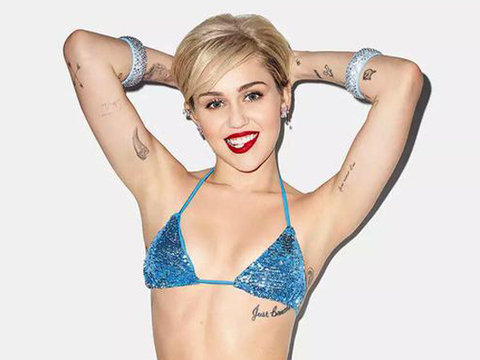 Miley Cyrus Plays It Smooth for Golden Lady Bikini Promo